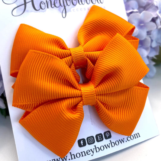 2.5 inch tangerine tux bows